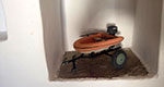 Toys from clay and metal - speed boat